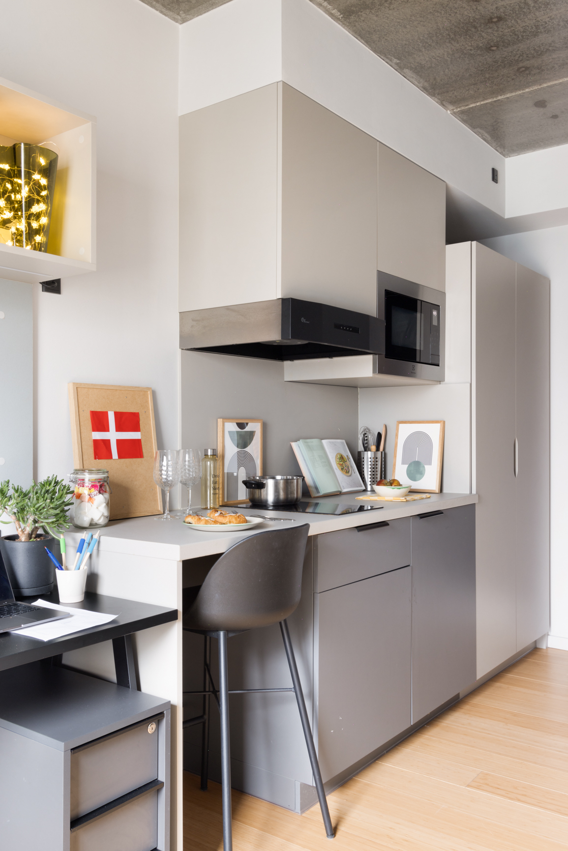Small but Mighty Studio mini kitchen at Basestack Bryggen student accommodation and apartments to rent in Copenhagen