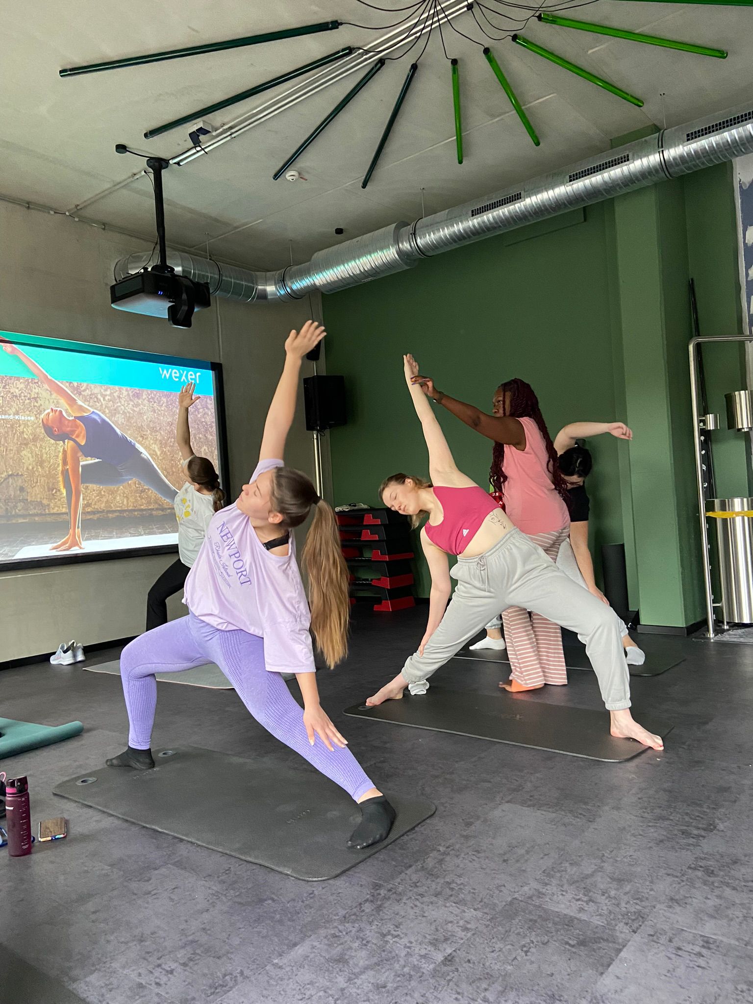 students doing yoga class