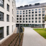 Contemporary Tribera student housing building with multiple floors and large windows